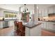 Updated kitchen featuring a large island with seating, stainless steel appliances, and ample counter space at 2121 Suzanne Dr, Mount Dora, FL 32757