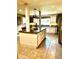 Kitchen featuring an island, pendant lighting, and stainless steel appliances at 2121 Suzanne Dr, Mount Dora, FL 32757