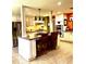 Open kitchen concept featuring an island and stainless steel appliances at 2121 Suzanne Dr, Mount Dora, FL 32757