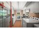 Bright laundry room with modern appliances, ample counter space, and lots of natural light at 2121 Suzanne Dr, Mount Dora, FL 32757