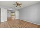 The spacious bedroom offers wood-look floors and a bright, airy feel at 2204 Margarita Dr, The Villages, FL 32159