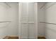 Walk-in closet with adjustable shelving offering ample storage at 2204 Margarita Dr, The Villages, FL 32159
