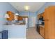 Spacious kitchen with stainless steel appliances, and an eat-in breakfast bar at 2204 Margarita Dr, The Villages, FL 32159