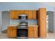 Well-equipped kitchen with stainless steel appliances and plenty of cabinet space at 2204 Margarita Dr, The Villages, FL 32159