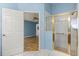 Updated bathroom with shower and glass doors at 2204 Margarita Dr, The Villages, FL 32159