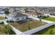 Spacious, fenced backyard offers privacy, ready for outdoor activities or relaxing at 2256 Gladiolus Ln, Mascotte, FL 34753
