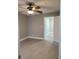 This bedroom features tile flooring and a ceiling fan with light at 234 Afton Sq # 305, Altamonte Springs, FL 32714