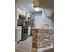 Updated kitchen featuring stainless steel appliances, stone backsplash and breakfast bar at 234 Afton Sq # 305, Altamonte Springs, FL 32714