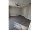 Spacious room featuring neutral walls, new laminate floors, and a ceiling fan for added comfort at 236 Afton Sq # 309, Altamonte Springs, FL 32714