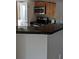 Charming kitchen featuring an eat-in breakfast bar with granite countertops and stainless steel appliances at 236 Afton Sq # 309, Altamonte Springs, FL 32714