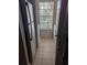 Practical laundry area featuring washer/dryer hookups, tile floors, and a bright window offering natural light at 236 Afton Sq # 309, Altamonte Springs, FL 32714