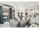Open-concept area showcasing kitchen, dining area, and living room at 2497 Heritage Green Ave, Davenport, FL 33837