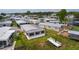 Wonderful aerial view of lakeside homes with a dock for enjoying waterfront living at 25 Captains Pt, Fruitland Park, FL 34731