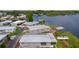 Aerial view of beautiful lakeside homes each featuring private waterfront access at 25 Captains Pt, Fruitland Park, FL 34731