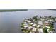 Scenic view of a lakeside neighborhood offering serene living near the water at 25 Captains Pt, Fruitland Park, FL 34731