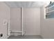 Unfinished basement with exposed drywall, utilities, and a window, ready for customization at 25 Captains Pt, Fruitland Park, FL 34731