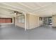 Spacious patio with ceiling fan, suitable for outdoor gatherings and enjoying fresh air at 25 Captains Pt, Fruitland Park, FL 34731