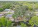 Waterfront home with mature trees, boat dock, and proximity to a lake at 2529 Cr 448, Lake Panasoffkee, FL 33538