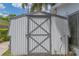 Exterior close-up of outdoor storage shed, offering practical storage space and convenience at 2529 Cr 448, Lake Panasoffkee, FL 33538