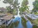 Picturesque waterfront view with docks and boat lift at 2529 Cr 448, Lake Panasoffkee, FL 33538