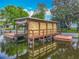 Private boat dock and lift offering direct water access for boating and recreation at 26619 Bimini Dr, Tavares, FL 32778