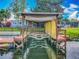 Private boat dock and lift offering direct water access for boating and recreation at 26619 Bimini Dr, Tavares, FL 32778
