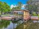 Private boat dock and lift offering direct water access for boating and recreation at 26619 Bimini Dr, Tavares, FL 32778