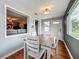 Open dining room with wood floors, lots of natural light, and an open concept layout at 26619 Bimini Dr, Tavares, FL 32778