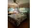 Bedroom with hardwood flooring and built-in dresser at 313 Palo Verde Dr, Leesburg, FL 34748