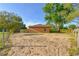 An empty backyard featuring trees, and partial fence at 316 Betty Ln, Mascotte, FL 34753