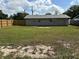 View of backyard features a new wooden fence and plenty of room to roam at 32737 Vista Ave, Leesburg, FL 34788