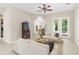 Inviting living space with tile flooring, comfortable seating, and ample natural light at 33222 Irongate Dr, Leesburg, FL 34788