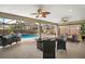 Spacious lanai with pool is the perfect space for relaxing and entertaining with beautiful views at 3354 Truluck Pl, Oxford, FL 34484