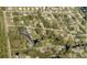 Aerial view of property with outlined borders in a neighborhood at 33710 Linda Ln, Leesburg, FL 34748