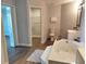 Bathroom showcases a soaking tub, modern fixtures, and an adjoining closet for convenience at 33710 Linda Ln, Leesburg, FL 34748