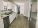 Modern kitchen featuring stainless steel appliances and granite counters at 33710 Linda Ln, Leesburg, FL 34748