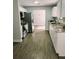 Modern kitchen featuring stainless steel appliances and granite counters at 33710 Linda Ln, Leesburg, FL 34748