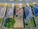 Home, yard, and neighborhood illustrated in an aerial view at 34107 Alameda Dr, Sorrento, FL 32776