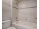 Bright bathroom with tiled bathtub and shower at 34107 Alameda Dr, Sorrento, FL 32776