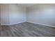 Neutral bedroom features updated paint, modern flooring and ample natural light at 34107 Alameda Dr, Sorrento, FL 32776