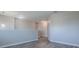 Bright hallway features durable gray flooring and fresh neutral paint at 34107 Alameda Dr, Sorrento, FL 32776