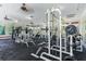 Bright gym featuring modern equipment, mirrors and ample natural light at 3440 Tumbling River Dr, Clermont, FL 34711