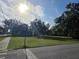 Spacious green property adjacent to a quiet street, presenting a development opportunity at 350 Cassady St, Umatilla, FL 32784