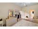 Comfortable bedroom boasts ample storage and a view of the ensuite bathroom at 3800 Woodleaf Ct, Leesburg, FL 34748