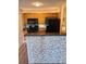Kitchen with stainless appliances, tile backsplash, and breakfast bar counter at 420 Forestway Cir # 206, Altamonte Springs, FL 32701