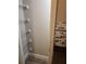 Pantry with wire shelving and decorative tile backsplash at 420 Forestway Cir # 206, Altamonte Springs, FL 32701