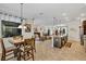 Open-concept living area with kitchen, dining, and living spaces all in one room at 4247 James River Cir, Leesburg, FL 34748
