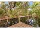 This backyard view showcases beautiful green trees and a serene canal at 4251 Magnolia Ave, Leesburg, FL 34748