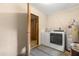 This laundry room features modern washer and dryer units at 4251 Magnolia Ave, Leesburg, FL 34748