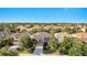 Stunning aerial view of the home nestled within a lush green neighborhood, showcasing its prime location at 4328 Acorn Ct, Davenport, FL 33837